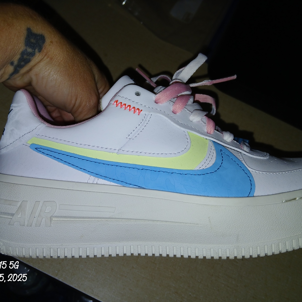 Nike White Sneakers with Blue and Yellow Details